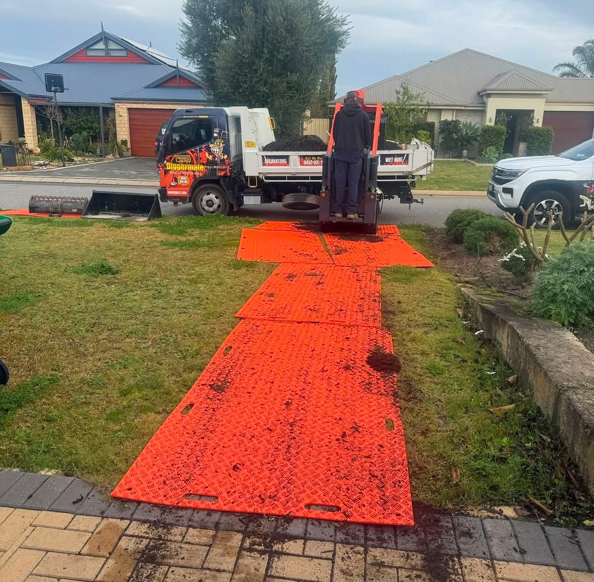 Supplied reference photograph of orange ground mats